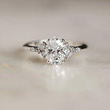 Diamond ring on a light background and marble surface