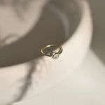 solid gold diamond helix earring on plate