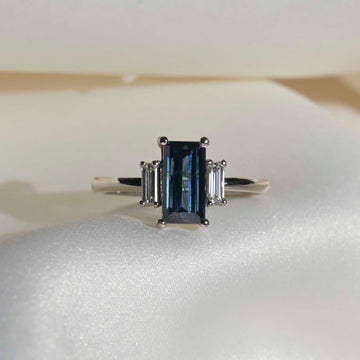18ct White Gold Blue Sapphire Baguette Three Stone Engagement Ring
