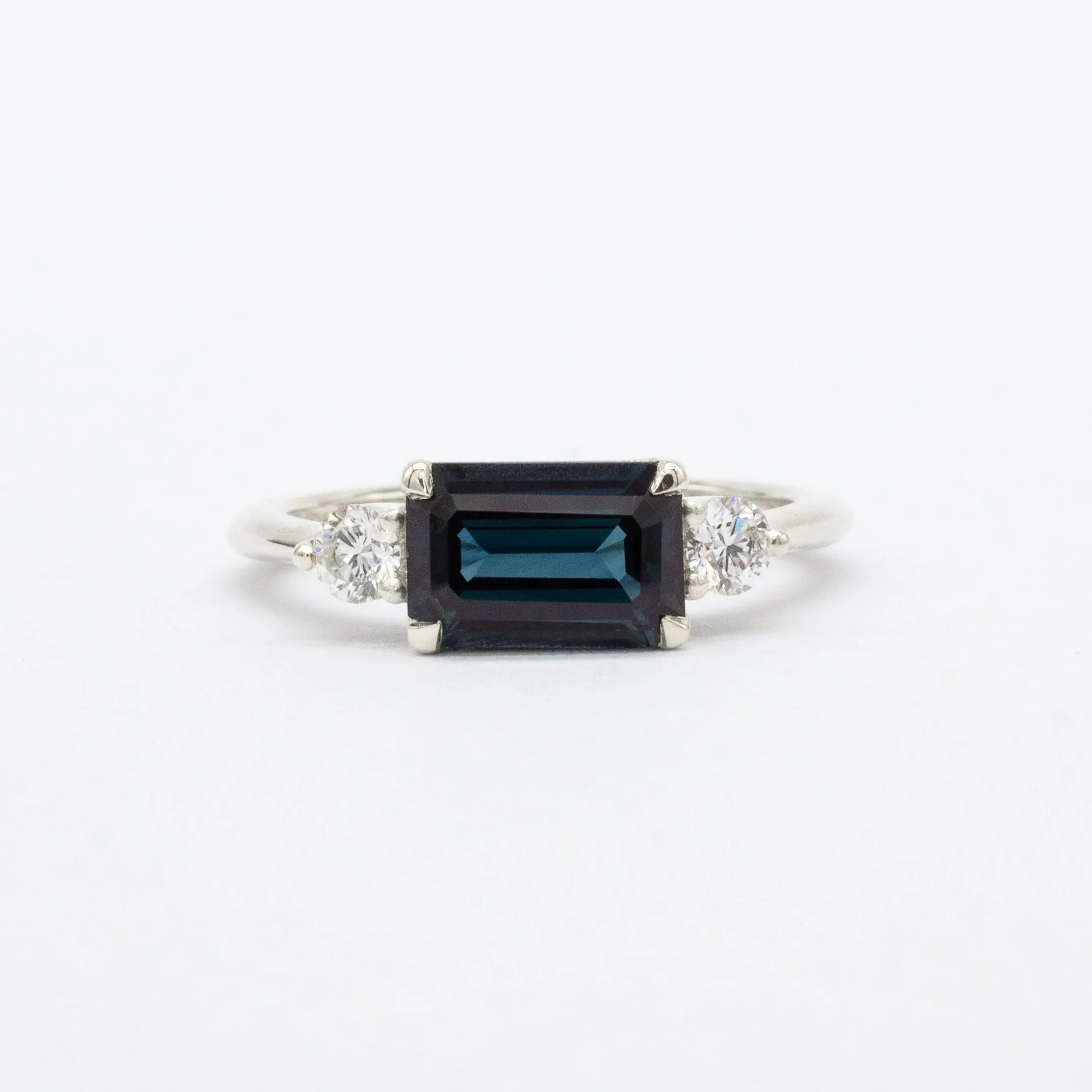 East-West Dark Blue Emerald Cut Trilogy Sapphire Engagement Ring-Engagement Rings-Wild Fawn Jewellery