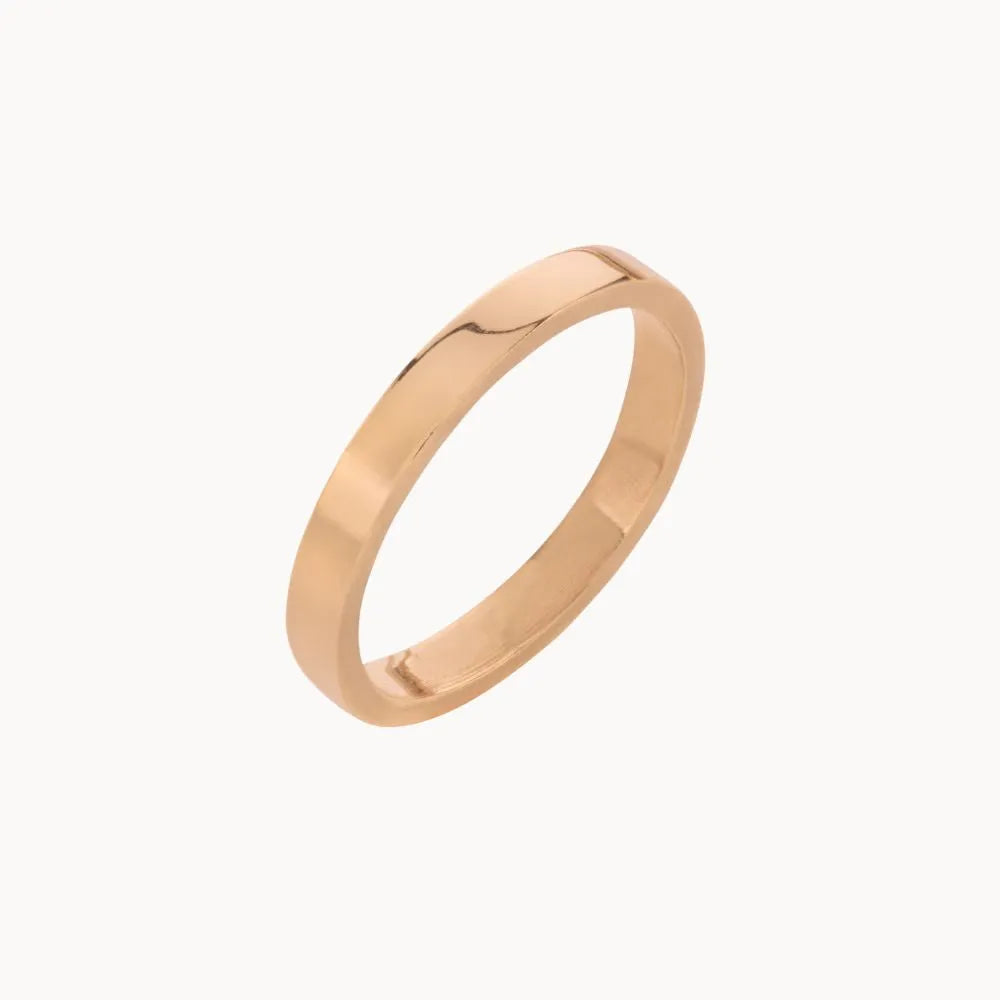 3mm flat rose gold wedding ring on a white background