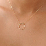 model wearing 9ct gold circle necklace
