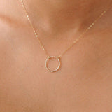 model wearing 9ct gold circle necklace