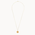 Gold compass necklace on chain