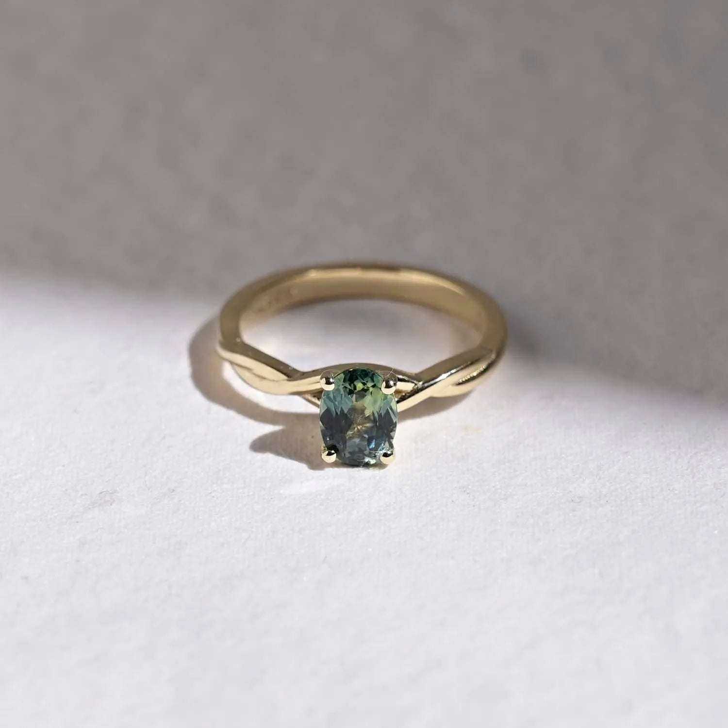 9ct Gold Teal Sapphire Solitaire Twisted Engagement Ring