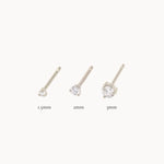 cut outs of white gold diamond studs in 1.5mm, 2mm and 3mm with size annotations