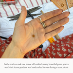 Sat beneath an oak tree in one of London’s many beautiful green spaces, our Mini Acorn pendant was handcrafted in wax during a team picnic