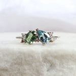 Asymmetric colourful sapphire engagement ring