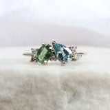 Asymmetric colourful sapphire engagement ring