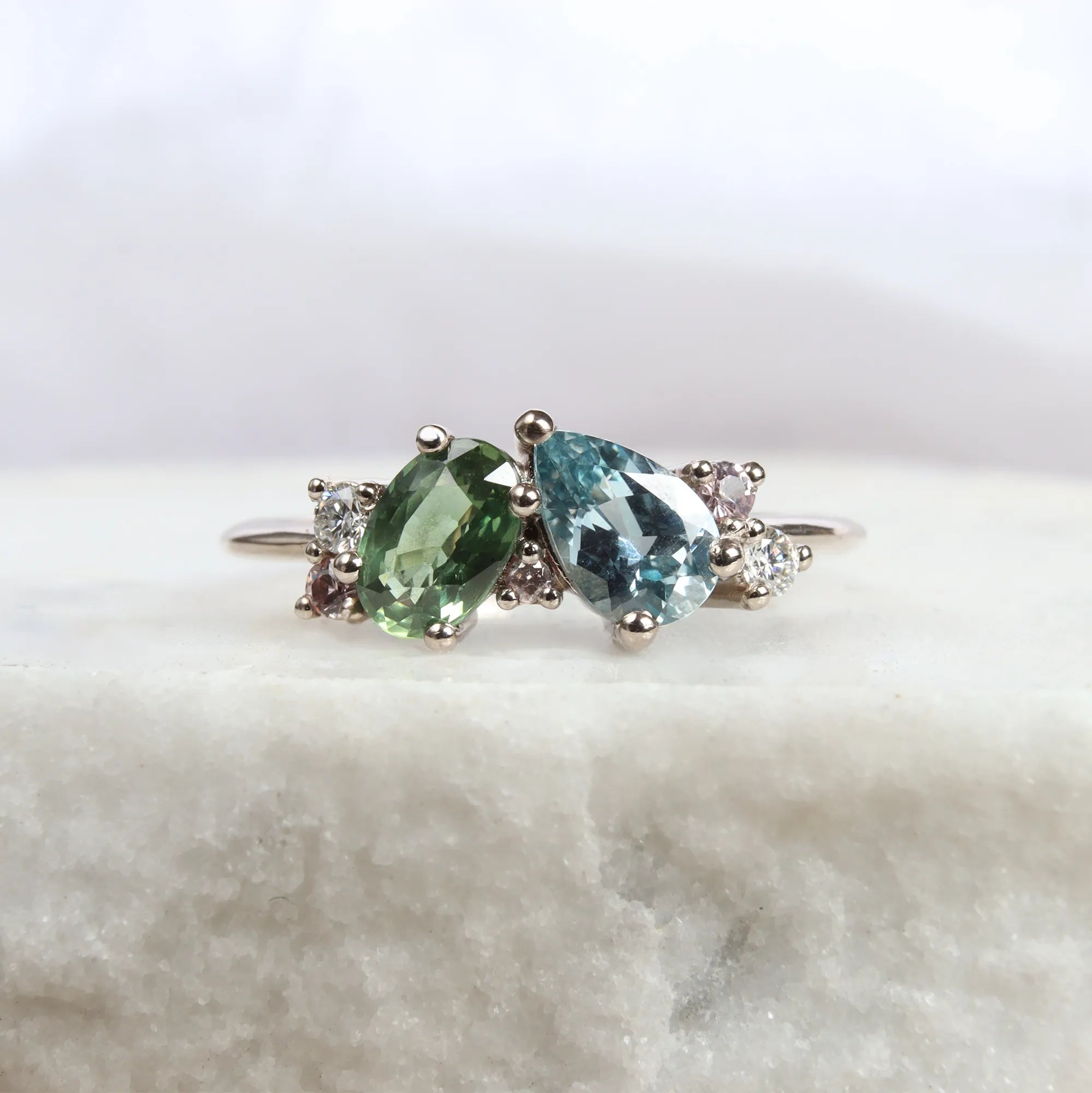 Asymmetric colourful sapphire engagement ring