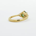 back view of hexgaon sapphire engagement ring with low setting on white background