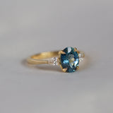Blue Oval Sapphire Engagement Ring with Pear Accent Diamonds