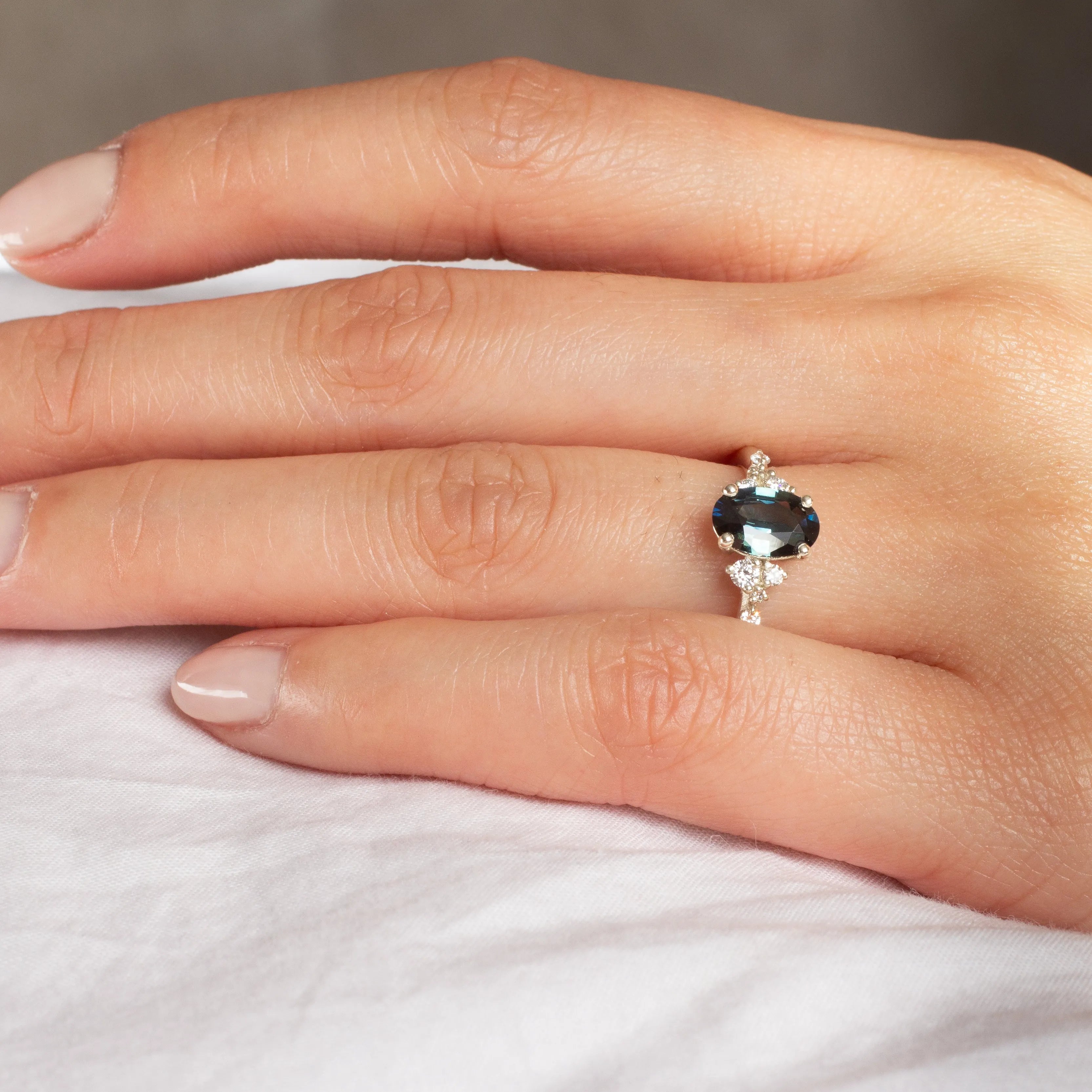 Blue Sapphire Engagement Ring with Scattered Diamonds