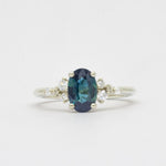 Blue Sapphire Engagement Ring with Scattered Diamonds