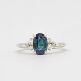 Blue Sapphire Engagement Ring with Scattered Diamonds