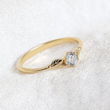 Delicate leaf engagement ring