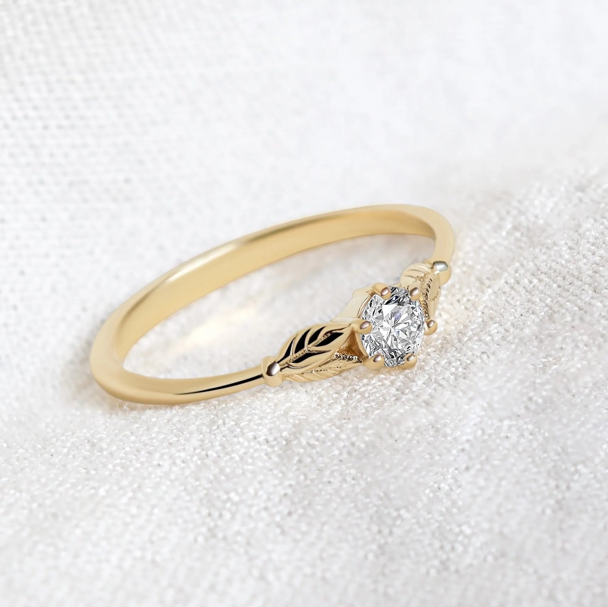 Delicate leaf engagement ring