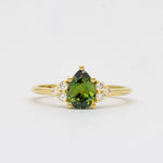 Green Pear Sapphire With Diamond Cluster Detail Engagement Ring