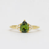 Green Pear Sapphire With Diamond Cluster Detail Engagement Ring