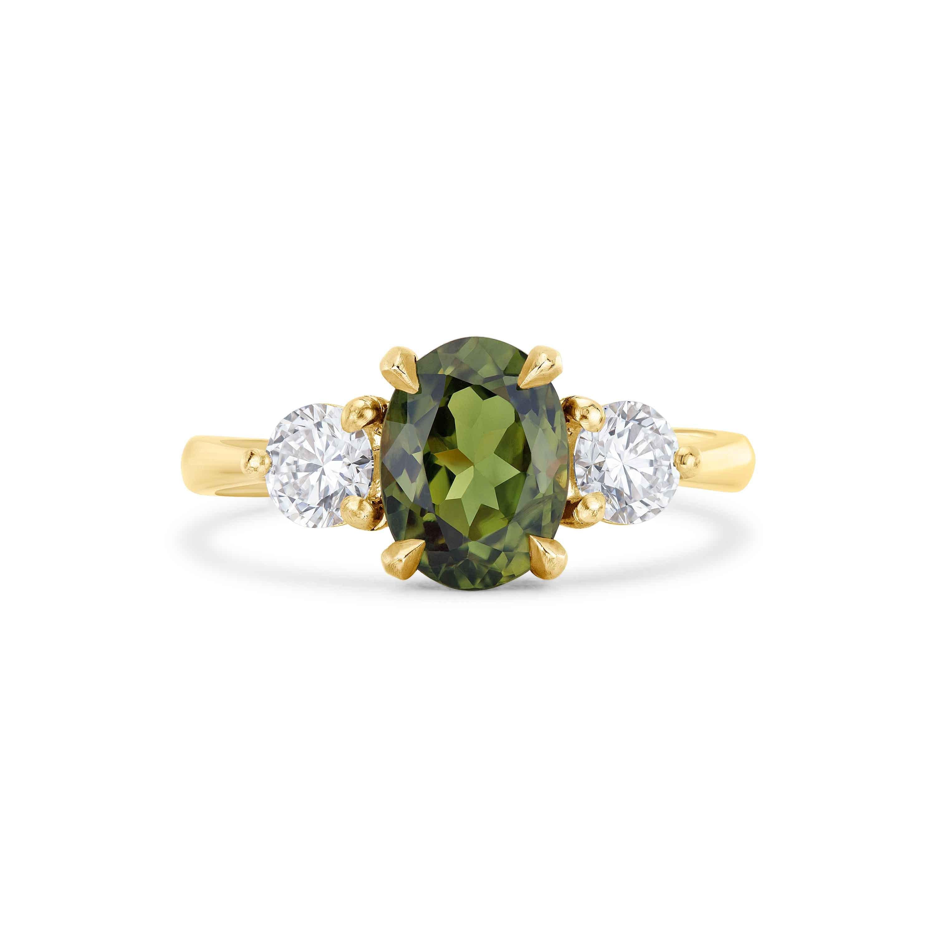 Green stone engagement ring discount