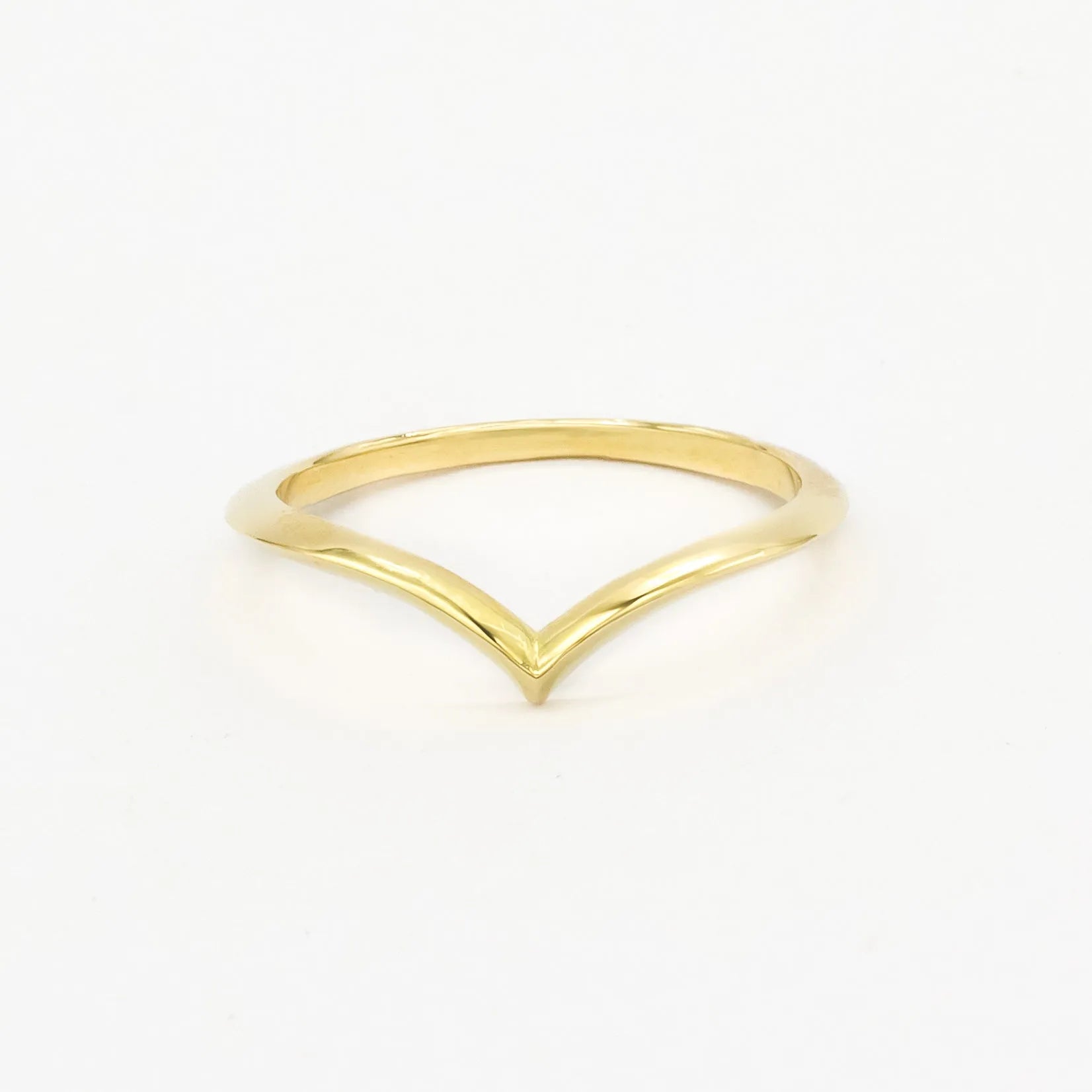slim 1.3mm wide chevron wedding ring with a V-shaped design on a white background