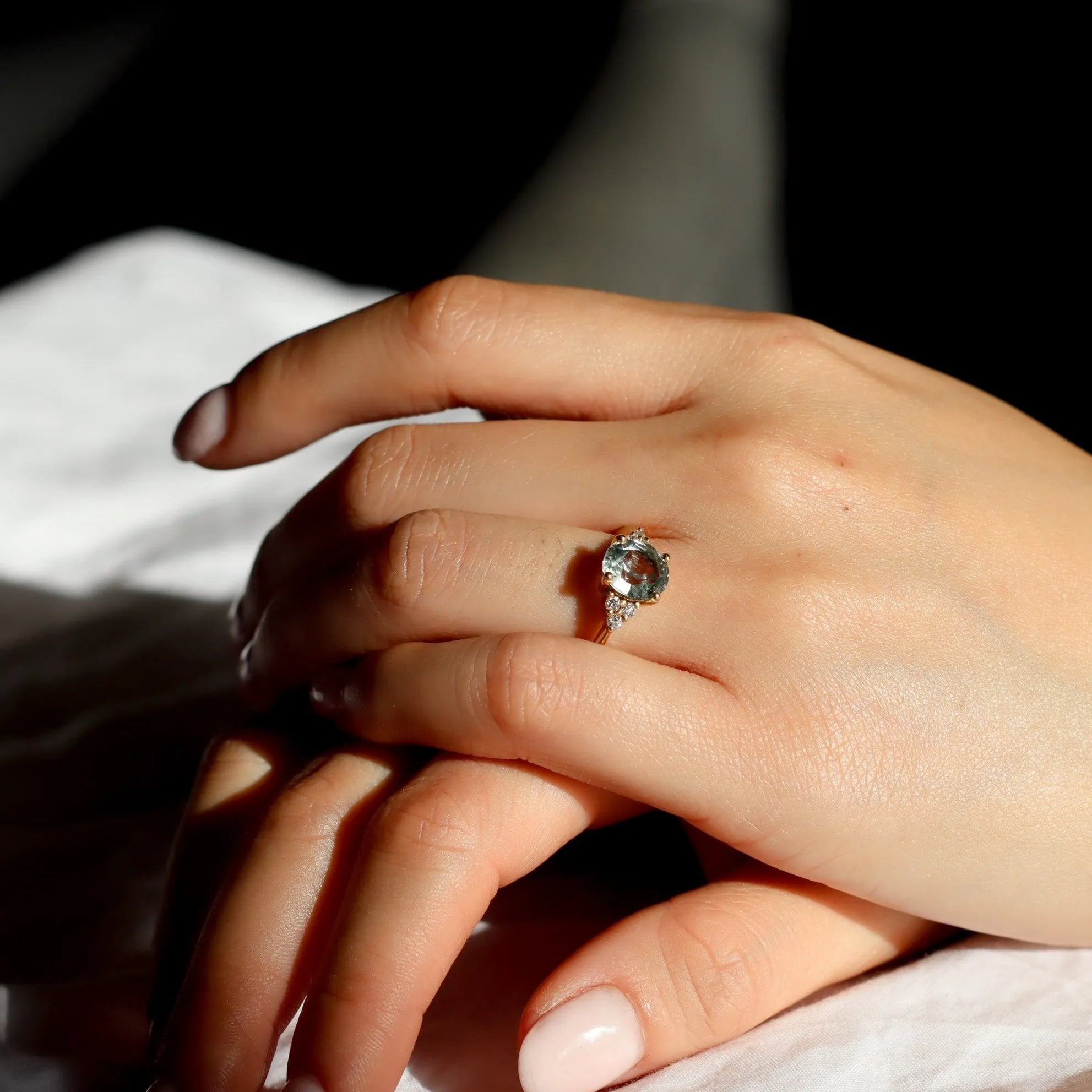 Light Blue Sapphire Engagement Ring With Cluster Diamonds