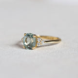 Light Blue Sapphire Engagement Ring With Cluster Diamonds
