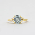 Light Blue Sapphire Engagement Ring With Cluster Diamonds