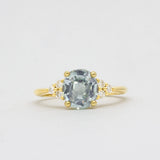 Light Blue Sapphire Engagement Ring With Cluster Diamonds