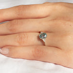 Light Blue Sapphire Engagement Ring with Trillion Cut Diamonds