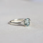 Light Blue Sapphire Engagement Ring with Trillion Cut Diamonds