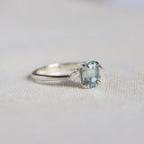 Light Blue Sapphire Engagement Ring with Trillion Cut Diamonds