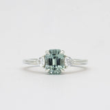 Light Blue Sapphire Engagement Ring with Trillion Cut Diamonds