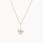 Silver acorn pendant necklace on a white background