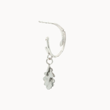 Silver hoop earring with a small dangling silver oak charm on a white background