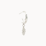 Silver leaf-shaped earring on a white background