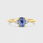 Oval Blue Sapphire Engagement Ring with Round Diamonds
