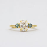 Oval Diamond and Green Tourmaline Trilogy Engagement Ring