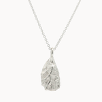 Silver pendant oyster necklace on a white background