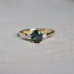Peacock Blue/Green Oval Sapphire Engagement Ring with Round Diamonds