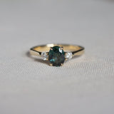 Peacock Blue/Green Oval Sapphire Engagement Ring with Round Diamonds
