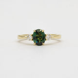Peacock Blue/Green Oval Sapphire Engagement Ring with Round Diamonds