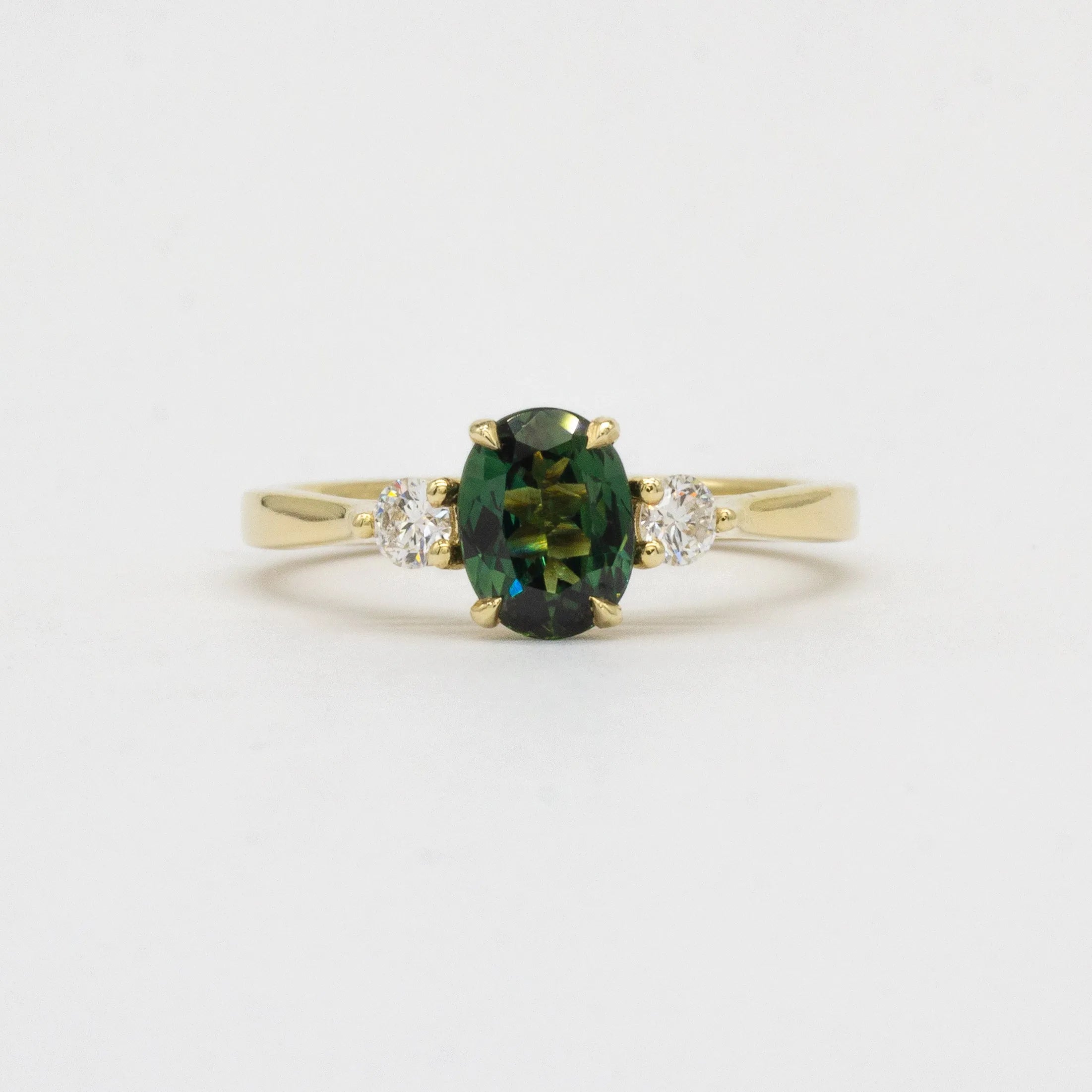 Peacock Blue/Green Oval Sapphire Engagement Ring with Round Diamonds