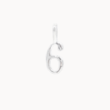 Silver number '6' pendant on a white background