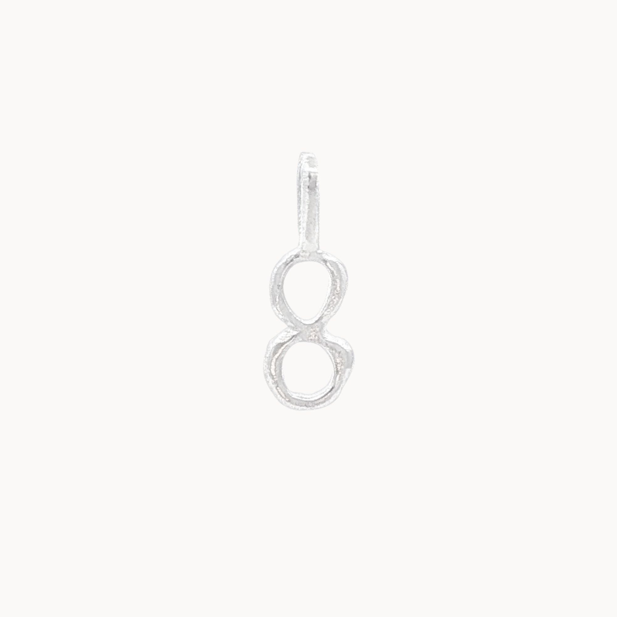 Silver number 8 pendant on a white background