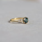 Round Green Sapphire Engagement Ring with Scattered Diamonds