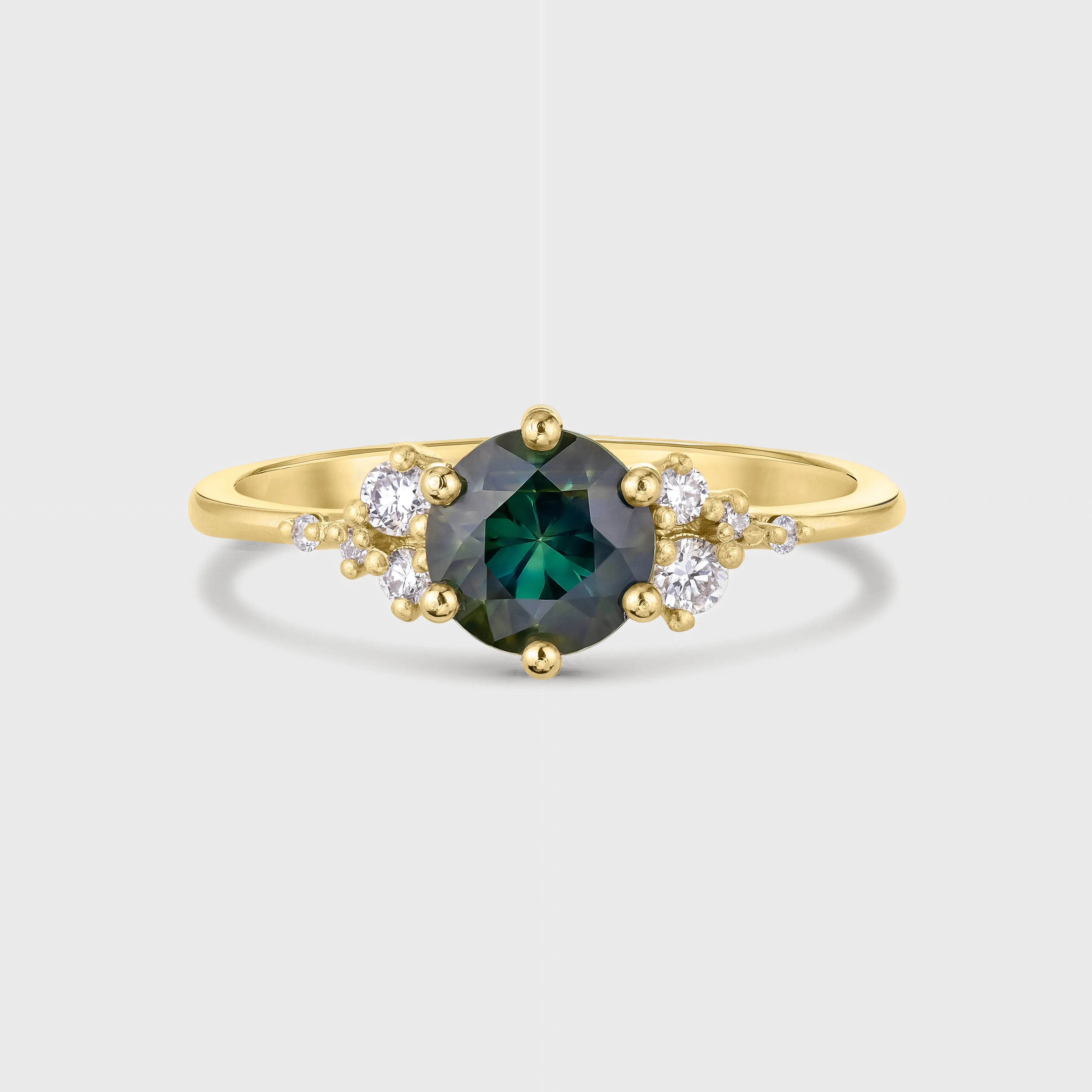 Round Green Sapphire Engagement Ring with Scattered Diamonds