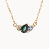 Gold necklace with a pear-shaped sapphire, round blue and green sapphires and diamonds
