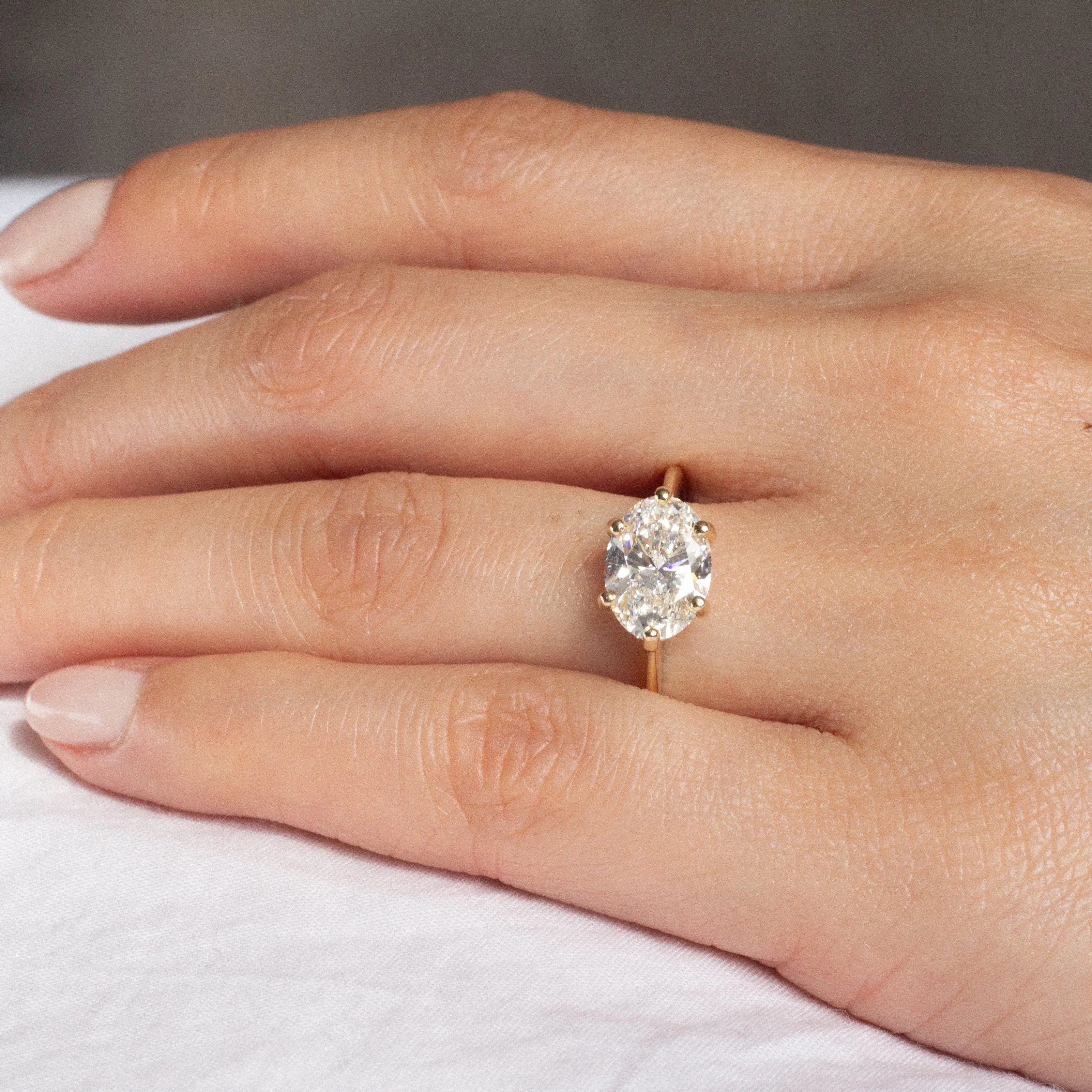 Solitaire East-West 6-Claw Diamond Engagement Ring