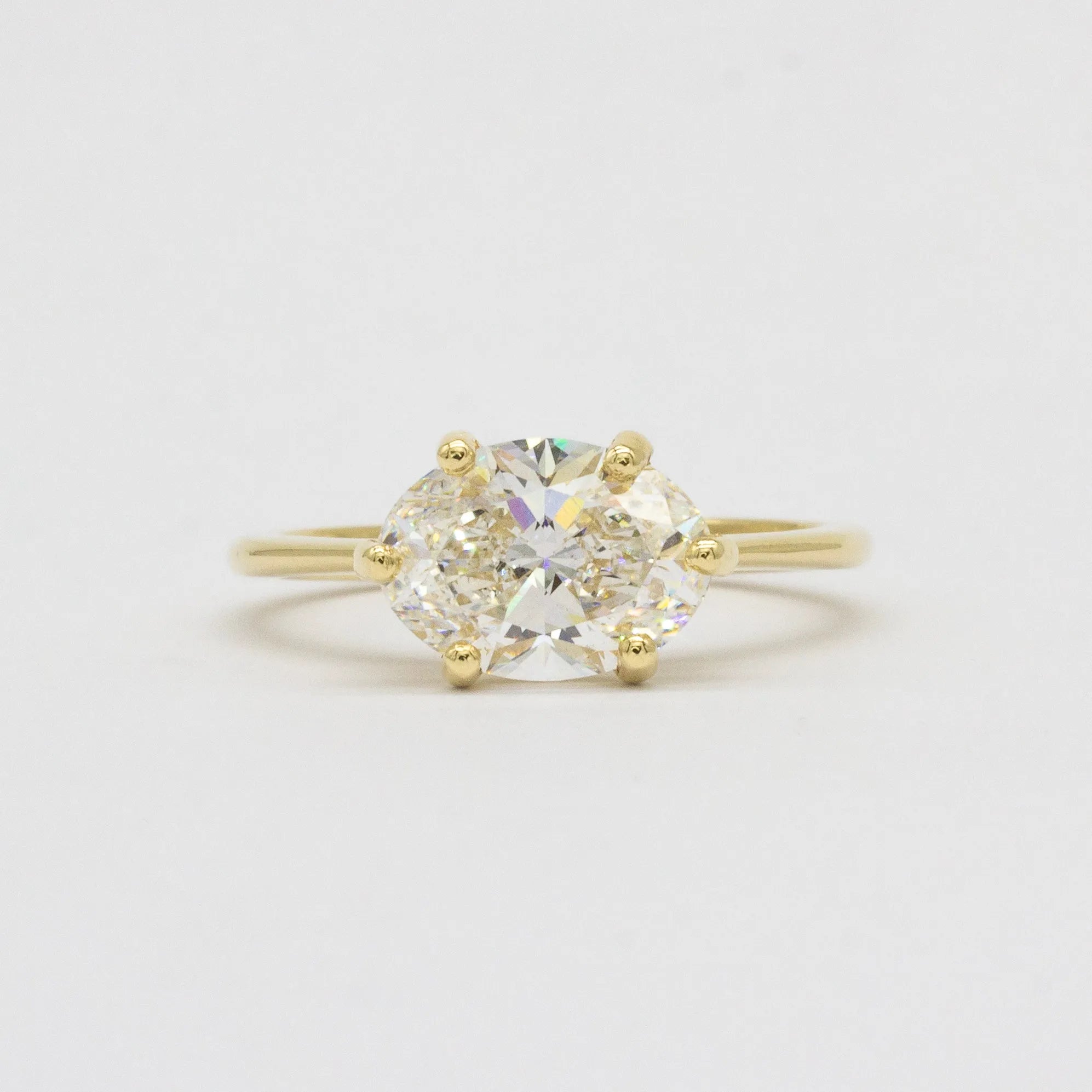 Solitaire East-West 6-Claw Diamond Engagement Ring